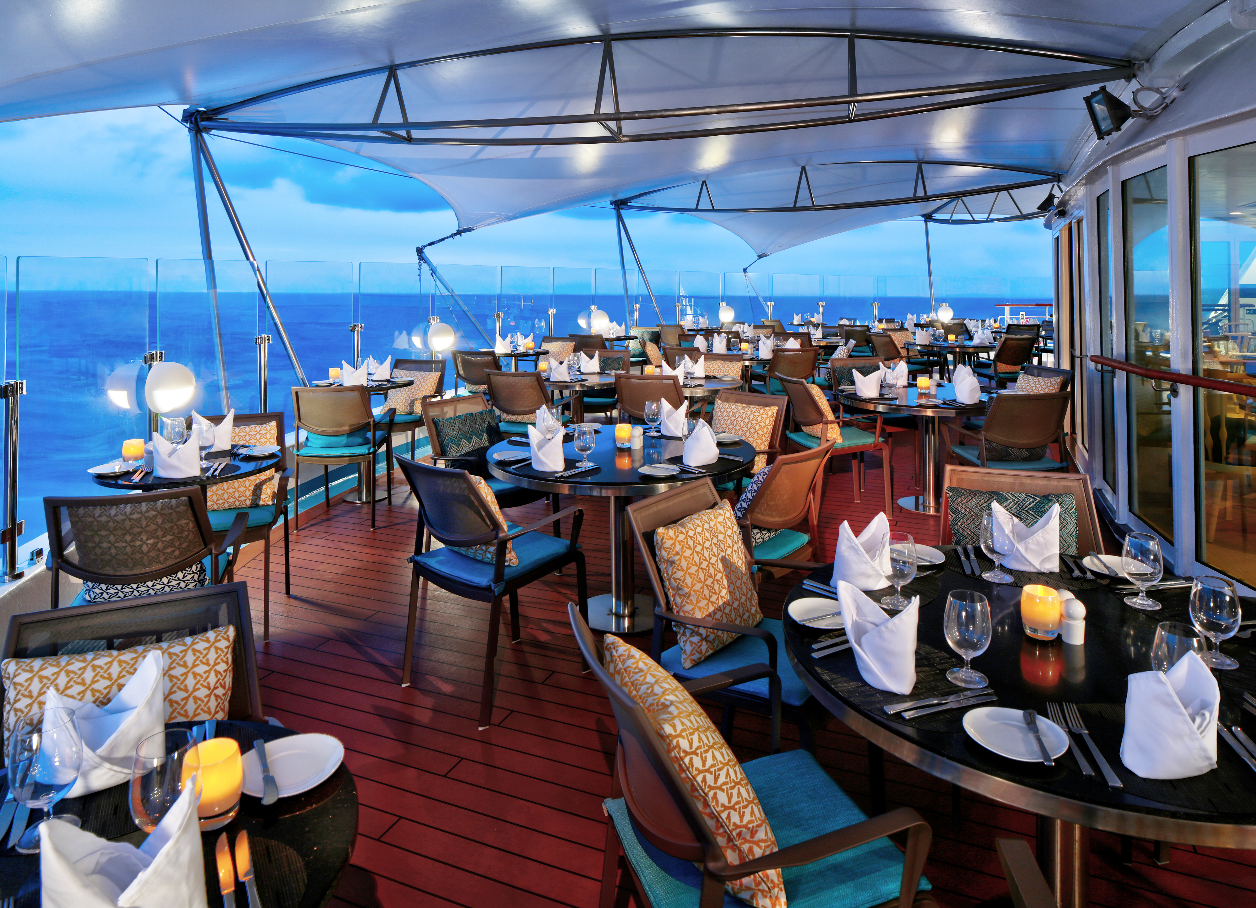 Watch the sunset while having dinner at Candles