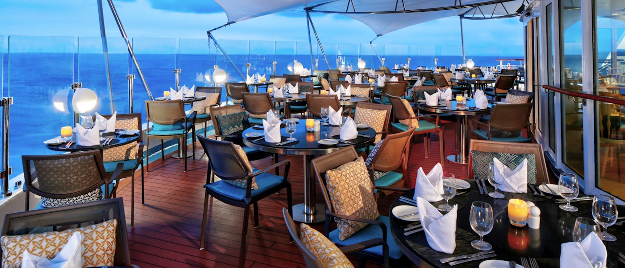 Watch the sunset while having dinner at Candles