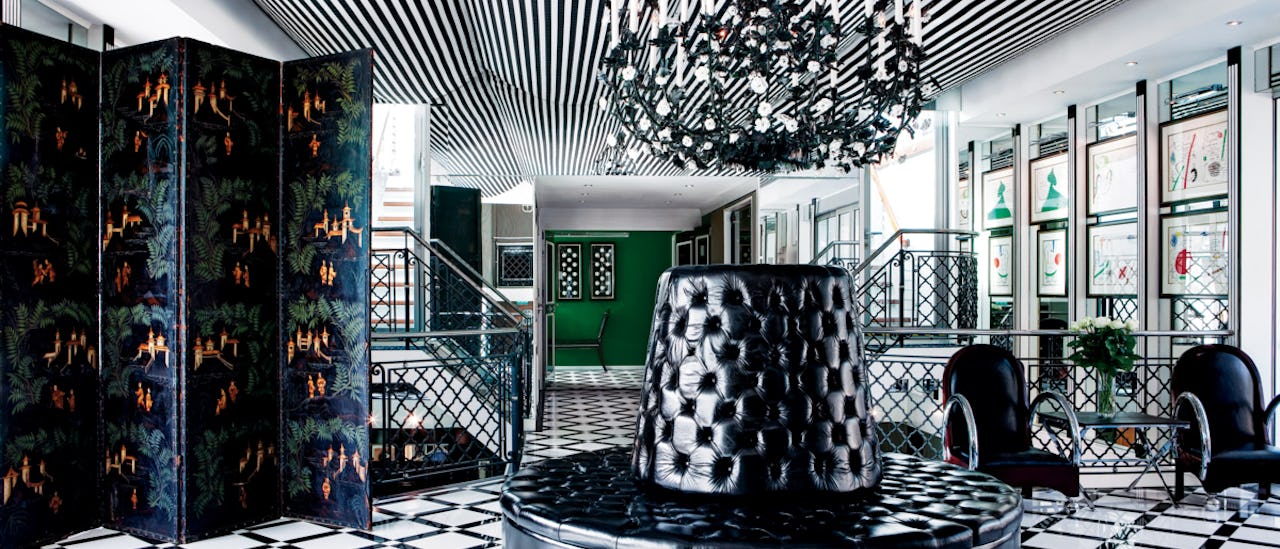 You are welcomed aboard through an impressive two-story lobby