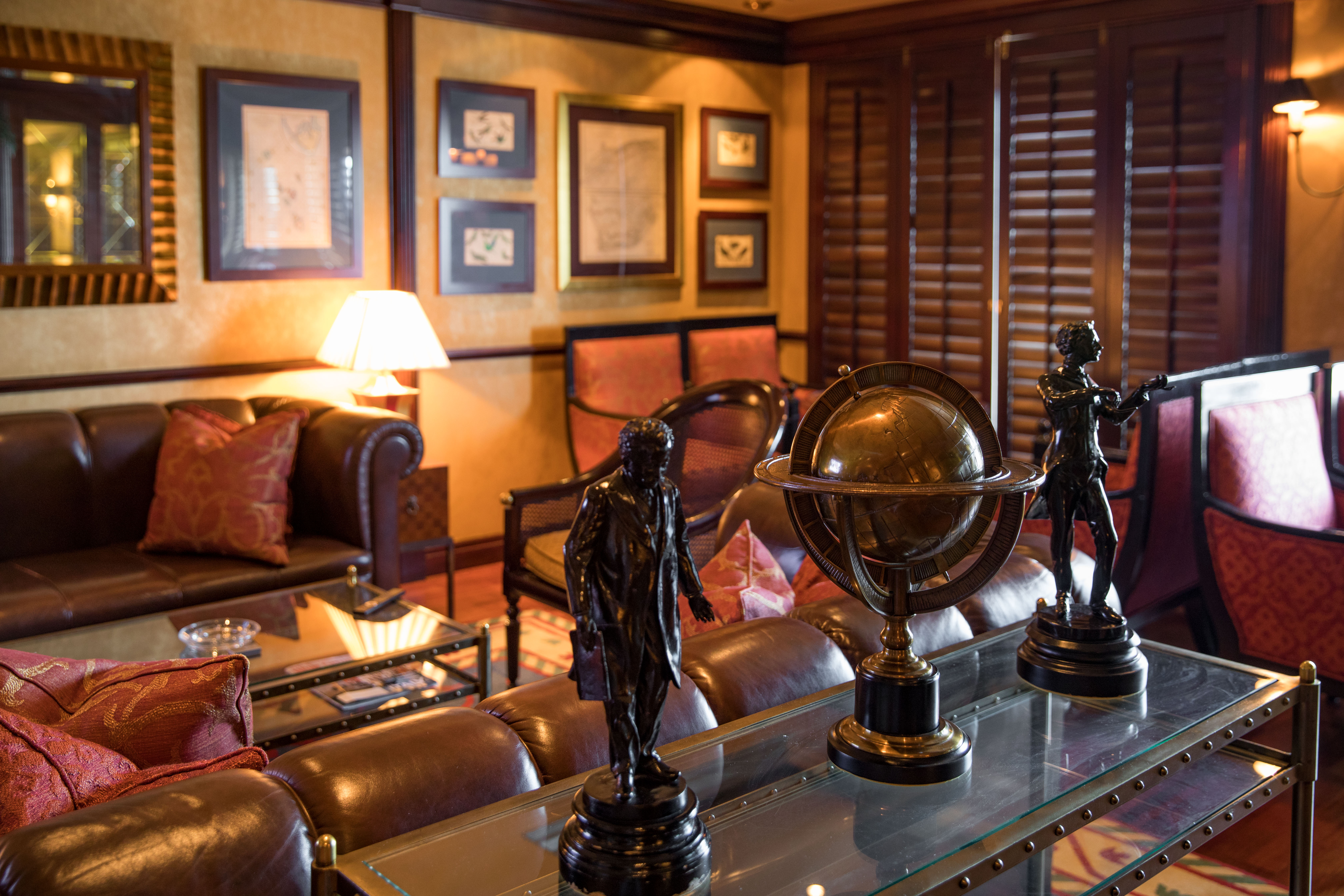 Indulge in the finest cigars and cognacs at the Connoisseur Club