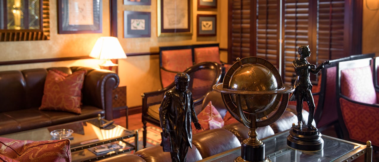 Indulge in the finest cigars and cognacs at the Connoisseur Club