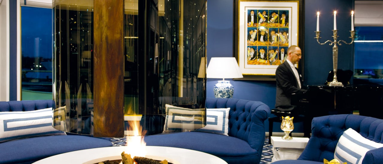 Main Lounge with a fireplace