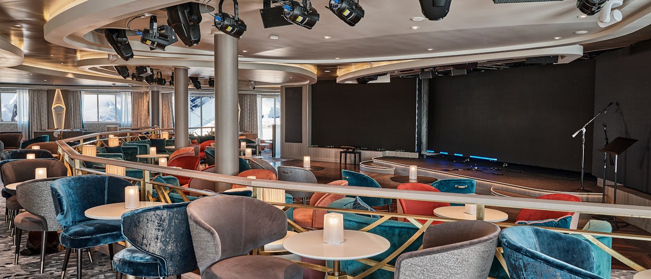The Explorer Lounge features a large LED screen that captures live images of wildlife and scenery via a remote-controlled gimbal camera system