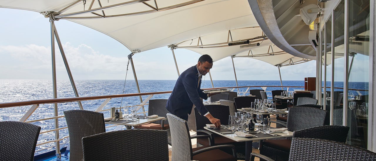 Outdoor dining with sea views