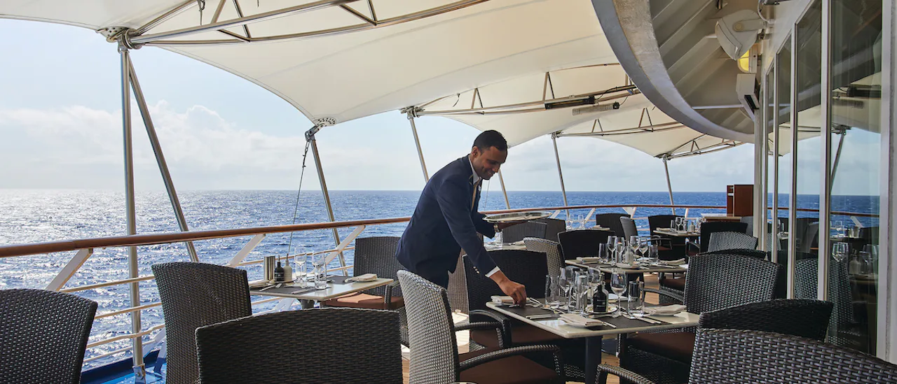 Outdoor dining with sea views