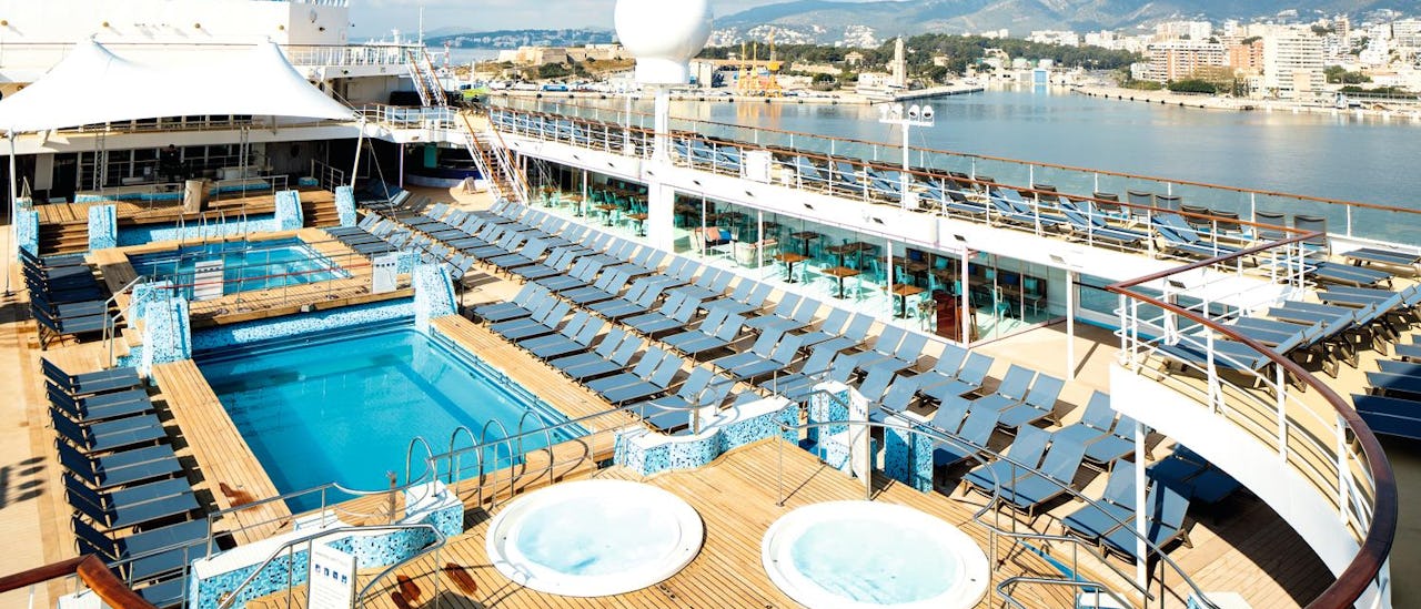 Poolside is where the action happens onboard. Relax or join the daily entertainment