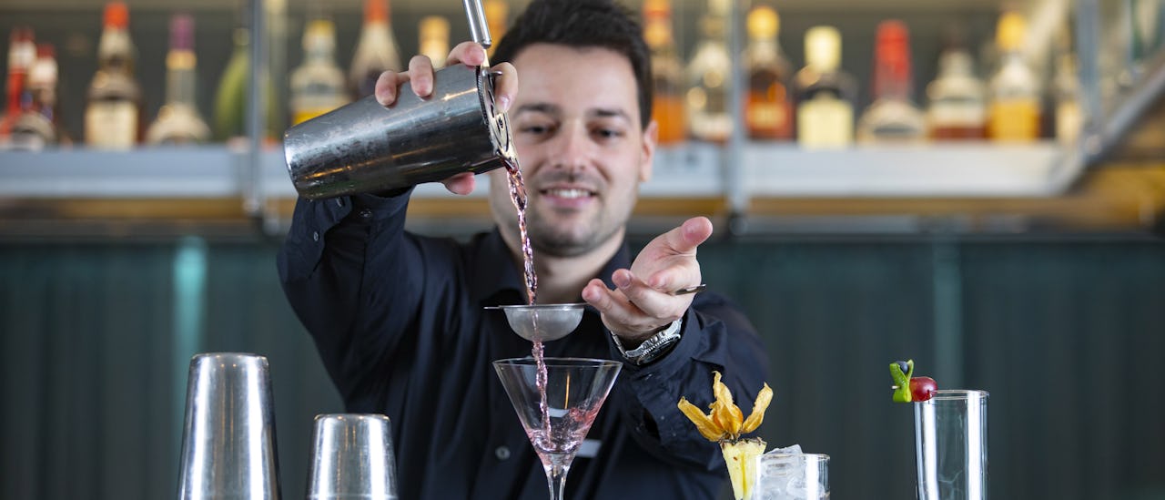 Have a cocktail in the Panorama Bar and Lounge